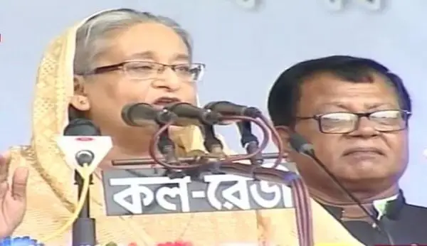 প্রধানমন্ত্রী speech at political rally with microphone and audience. Channel i News - চ্যানেল আই নিউজ