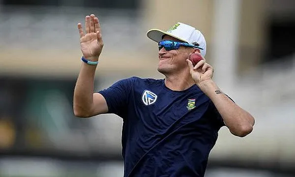 Cricket player holding a ball and waving during a match. Channel i News - চ্যানেল আই নিউজ