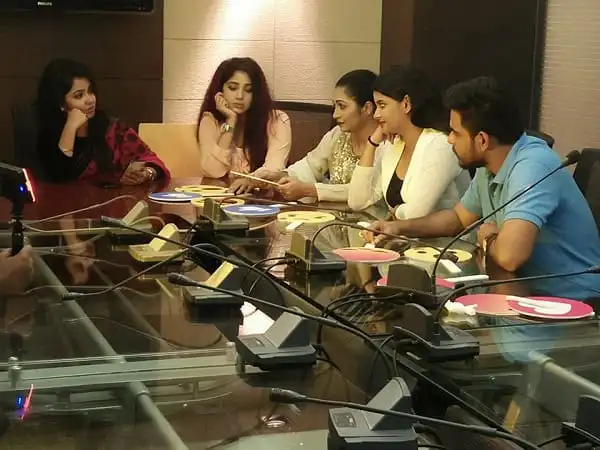 সংবাদ সম্মেলনে অংশগ্রহণকারী নারী ও পুরুষরা আলোচনা করছেন. Channel i News - চ্যানেল আই নিউজ