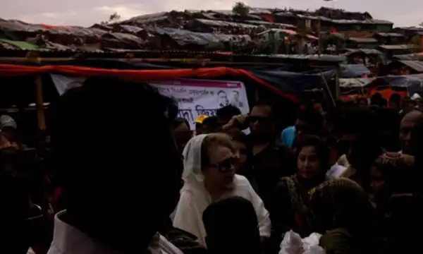 Crowd of people at a busy outdoor market or event in Bangladesh. Channel i News - চ্যানেল আই নিউজ