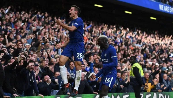 Chelsea players celebrate a goal during a match at Stamford Bridge. Channel i News - চ্যানেল আই নিউজ