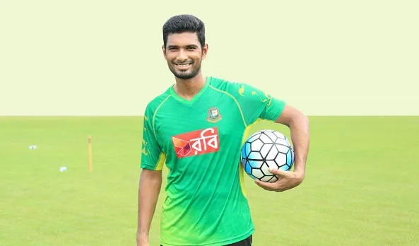 বাংলাদেশি ক্রিকেটার মাহমুদউল্লাহ ফুটবল হাতে মাঠে দাঁড়িয়ে. Channel i News - চ্যানেল আই নিউজ