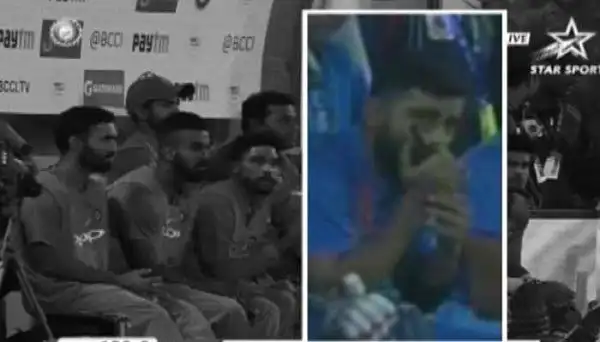 কোহলি ম্যাচের সময় ওয়াকি-টকি করছে, ছবি কালো-সাদা ও রঙিন অংশে বিভক্ত. Channel i News - চ্যানেল আই নিউজ
