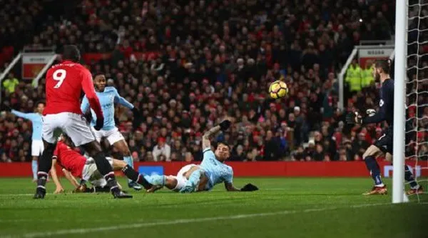 Manchester City player scores a goal during a match against Manchester United. Channel i News - চ্যানেল আই নিউজ