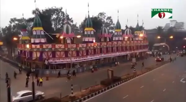 Bangladesh fairground with colorful rides and attractions at dusk. Channel i News - চ্যানেল আই নিউজ