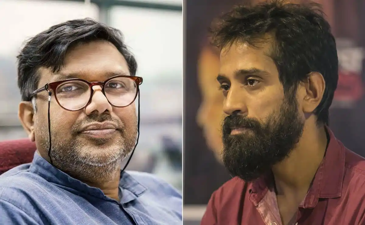 দুই পুরুষের ছবি, একজন হাস্যোজ্জ্বল, অন্যজন গভীর চিন্তাশীল. Channel i News - চ্যানেল আই নিউজ