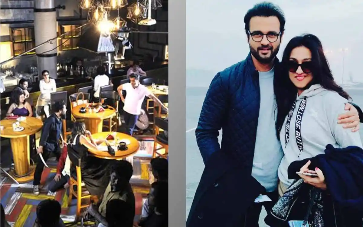 People enjoying a lively indoor restaurant scene with warm lighting and wooden furniture. Channel i News - চ্যানেল আই নিউজ