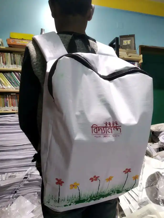 বিদ্যানন্দের স্কুলব্যাগ, খাতার পর নির্বাচনী ব্যানার দিয়ে সাজানো. Channel i News - চ্যানেল আই নিউজ