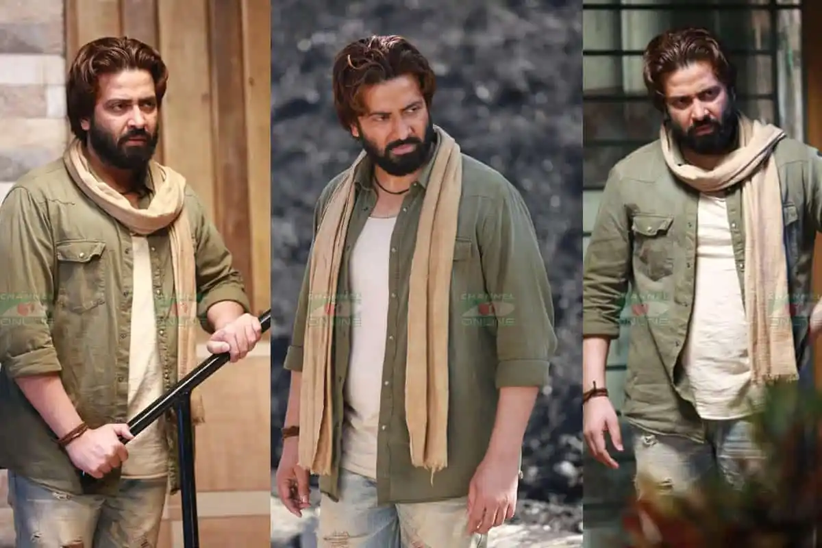 Popular Bengali actor in casual outfit with scarf, outdoor setting. Channel i News - চ্যানেল আই নিউজ