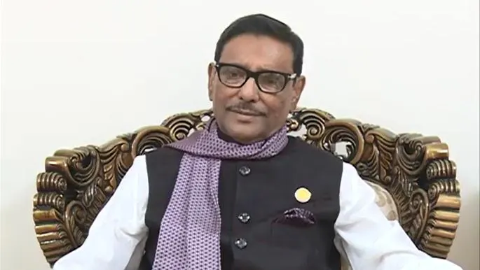 বাংলাদেশের একজন রাজনীতিবিদ বসে আছেন, পর্দার পেছনে সাদা পটভূমি।. Channel i News - চ্যানেল আই নিউজ