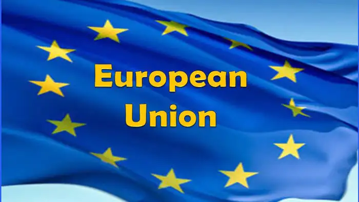 European Union flag with yellow stars and text on blue background. Channel i News - চ্যানেল আই নিউজ