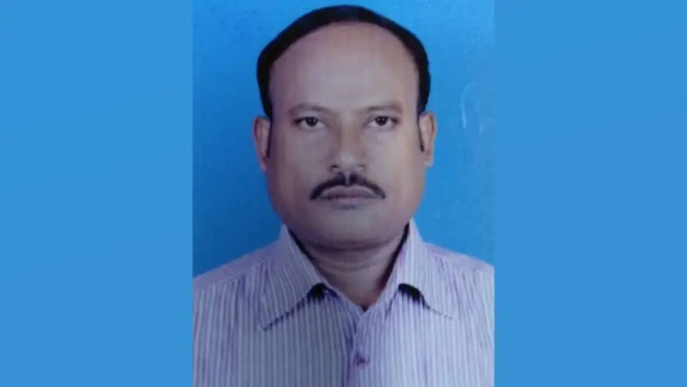 Police officer in formal attire with a serious expression. Channel i News - চ্যানেল আই নিউজ