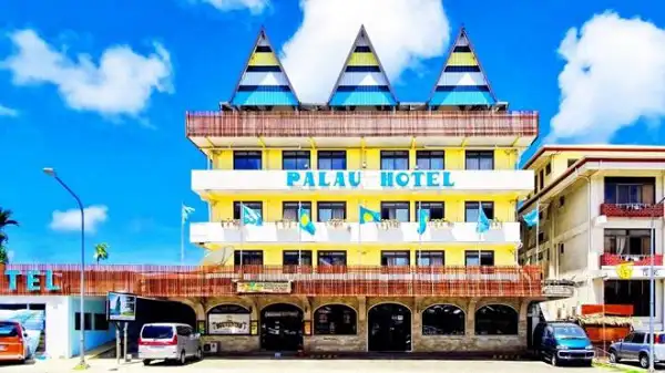Palau Hotel building with blue sky and clouds in the background. Channel i News - চ্যানেল আই নিউজ