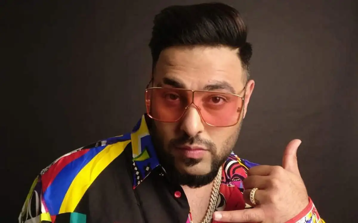 Fashionable man wearing sunglasses and a vibrant shirt, giving a thumbs-up gesture. Channel i News - চ্যানেল আই নিউজ