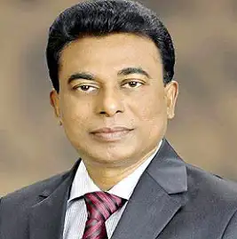 বাংলাদেশি ব্যক্তি পেশাদার পোশাকে, অফিস পরিবেশে ছবি. Channel i News - চ্যানেল আই নিউজ