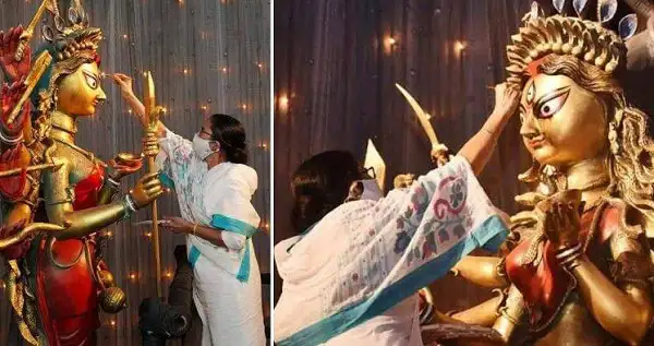 বিজেপি কর্মী দুর্গা প্রতিমার সামনে পুষ্পার্ঘ্য অর্পণ করছে. Channel i News - চ্যানেল আই নিউজ