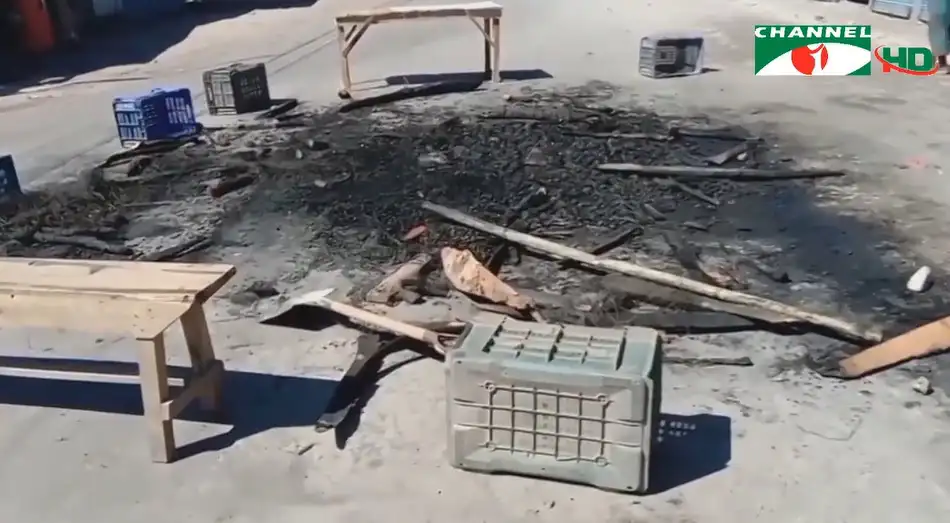 Burnt area with charred remains and scattered debris in Bangladesh. Channel i News - চ্যানেল আই নিউজ