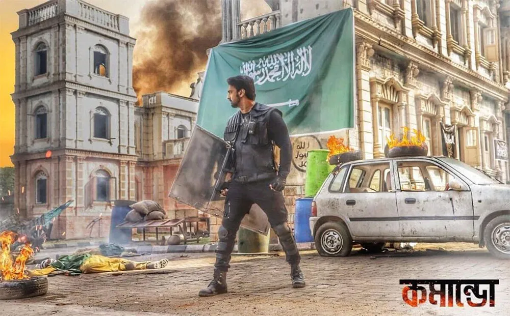 দাঙ্গা ও অগ্নিসংযোগের মাঝে একজন যুবক হাতে পতাকা ধরে দাঁড়িয়ে. Channel i News - চ্যানেল আই নিউজ