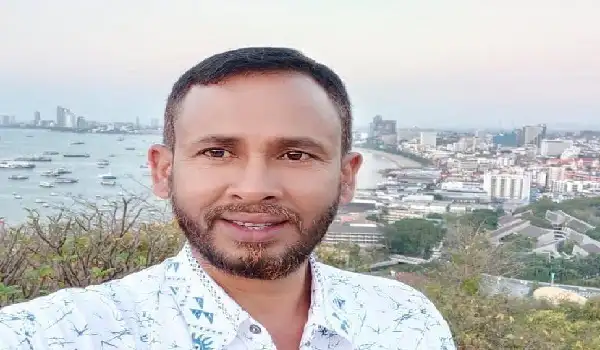 Bangladeshi man taking selfie with cityscape background. Channel i News - চ্যানেল আই নিউজ