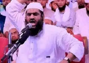 একজন বক্তা ধর্মীয় উন্মাদনা নিয়ে জনসম্মেলনে বক্তব্য দিচ্ছেন. Channel i News - চ্যানেল আই নিউজ