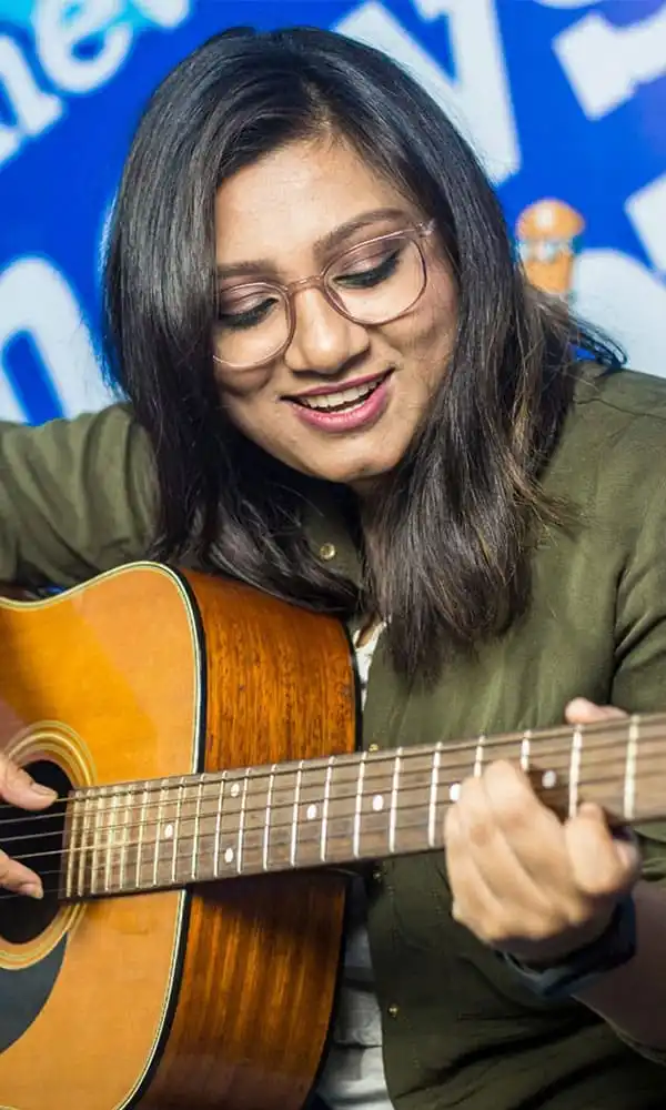 ফেরদৌস ওয়াহিদ হাসিমুখে, কালো শার্ট পরা, চুলে সাদা দাগ. Channel i News - চ্যানেল আই নিউজ