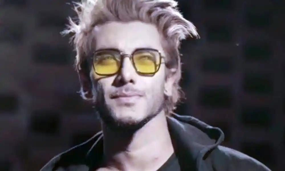 স্টাইলিশ যুবক wearing yellow glasses and black jacket. Channel i News - চ্যানেল আই নিউজ