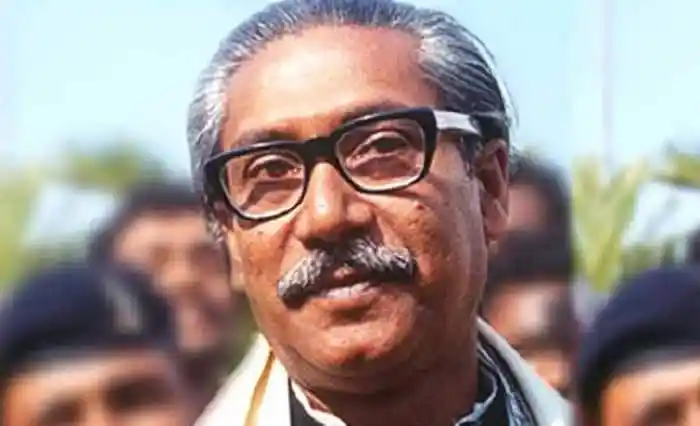বঙ্গবন্ধুর জন্মশতবার্ষিকী উপলক্ষে এক অনুষ্ঠানে বঙ্গবন্ধুর ছবি. Channel i News - চ্যানেল আই নিউজ