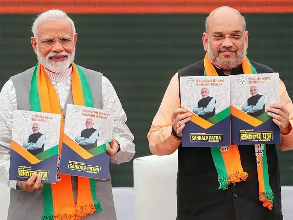 প্রধানমন্ত্রী মোদী ও অমিত শাহের ছবি, নির্বাচনী প্রচারনায় অংশগ্রহণ. Channel i News - চ্যানেল আই নিউজ