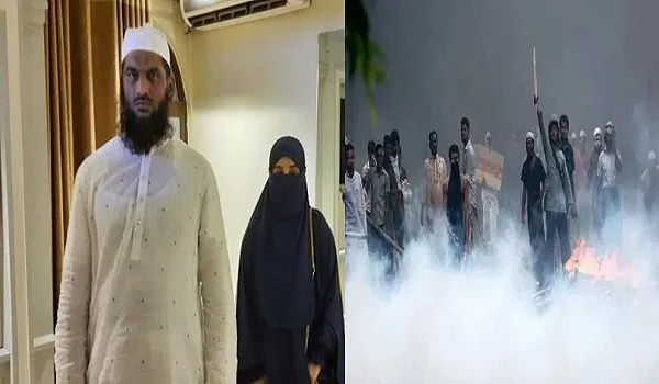 প্রতিবাদী জনতা বিক্ষোভে অংশগ্রহণ করছে, ধোঁয়া ও আগুনের মধ্যে. Channel i News - চ্যানেল আই নিউজ