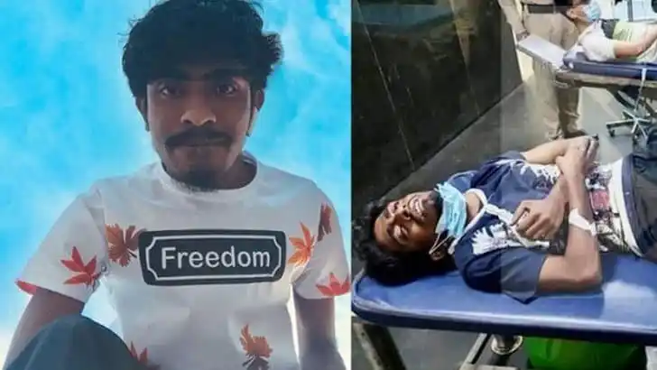 আহত যুবক হাসপাতালে চিকিৎসাধীন, মাথায় ব্যান্ডেজ বাঁধা. Channel i News - চ্যানেল আই নিউজ