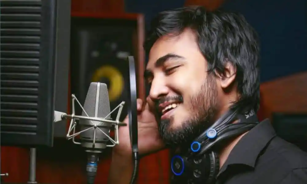 বাংলা গানের শিল্পী স্টুডিওতে recording করছে. Channel i News - চ্যানেল আই নিউজ