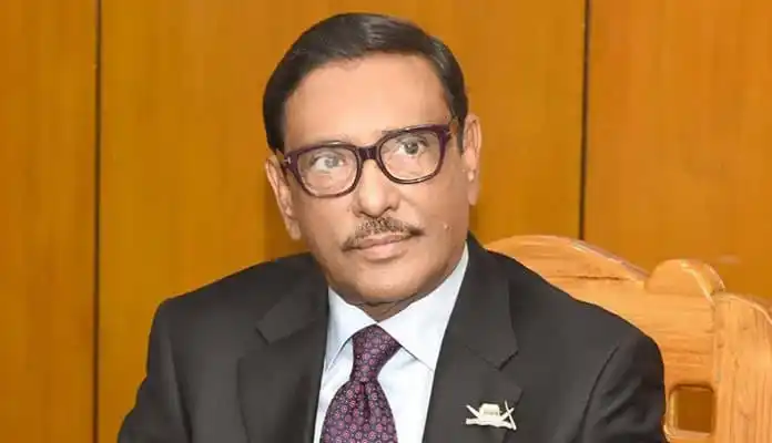 বাংলাদেশের একজন রাজনীতিবিদ, চামড়া চশমা পরা, সাদা শার্ট ও পিঙ্ক টাই পরিহিত।. Channel i News - চ্যানেল আই নিউজ
