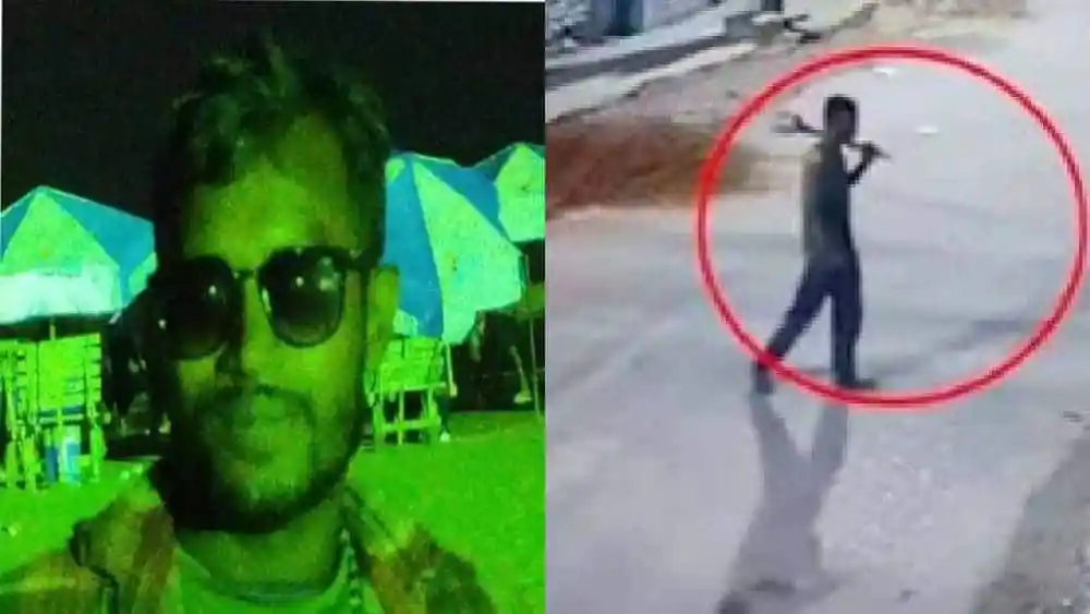 আটক যুবকের ছবি, তার হাতে কিছু বলার মতো বস্তু, চারপাশে ধূসর পরিবেশ।. Channel i News - চ্যানেল আই নিউজ
