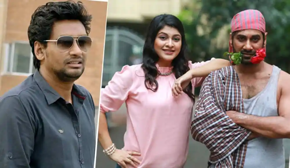তিনজন মানুষ, একজন পুরুষ, একজন নারী, অন্যজন পুরুষ, হাসি ও বন্ধুত্বের মুহূর্ত. Channel i News - চ্যানেল আই নিউজ