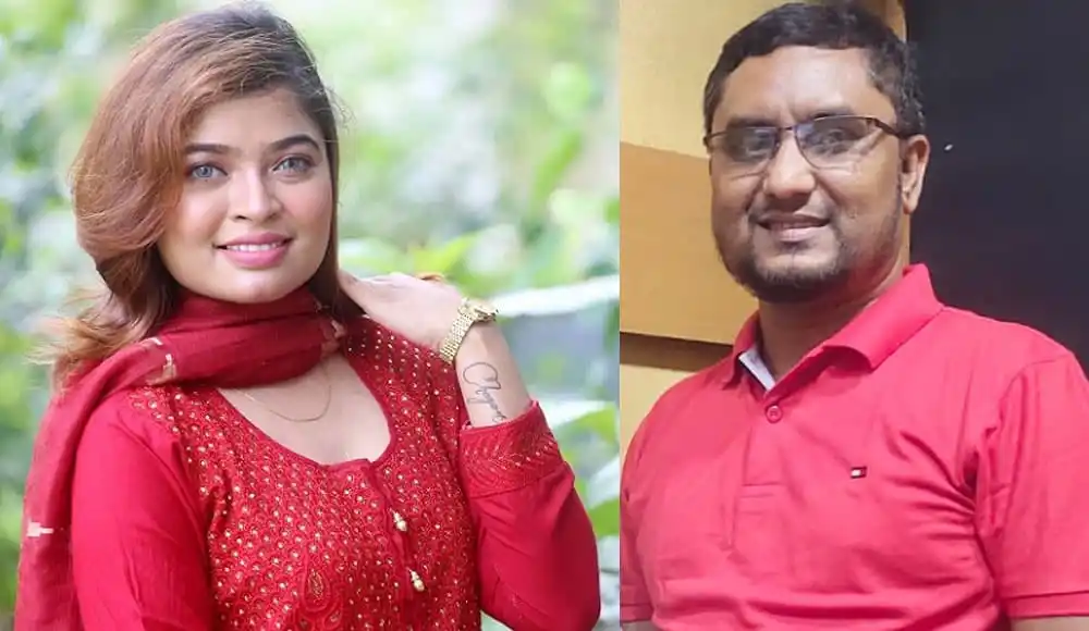 দুটি মানুষ, একজন নারী ও একজন পুরুষ, হাসিমুখে ছবি তুলেছেন. Channel i News - চ্যানেল আই নিউজ