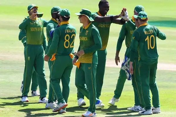 South African cricket team celebrating on the field during a match. Channel i News - চ্যানেল আই নিউজ