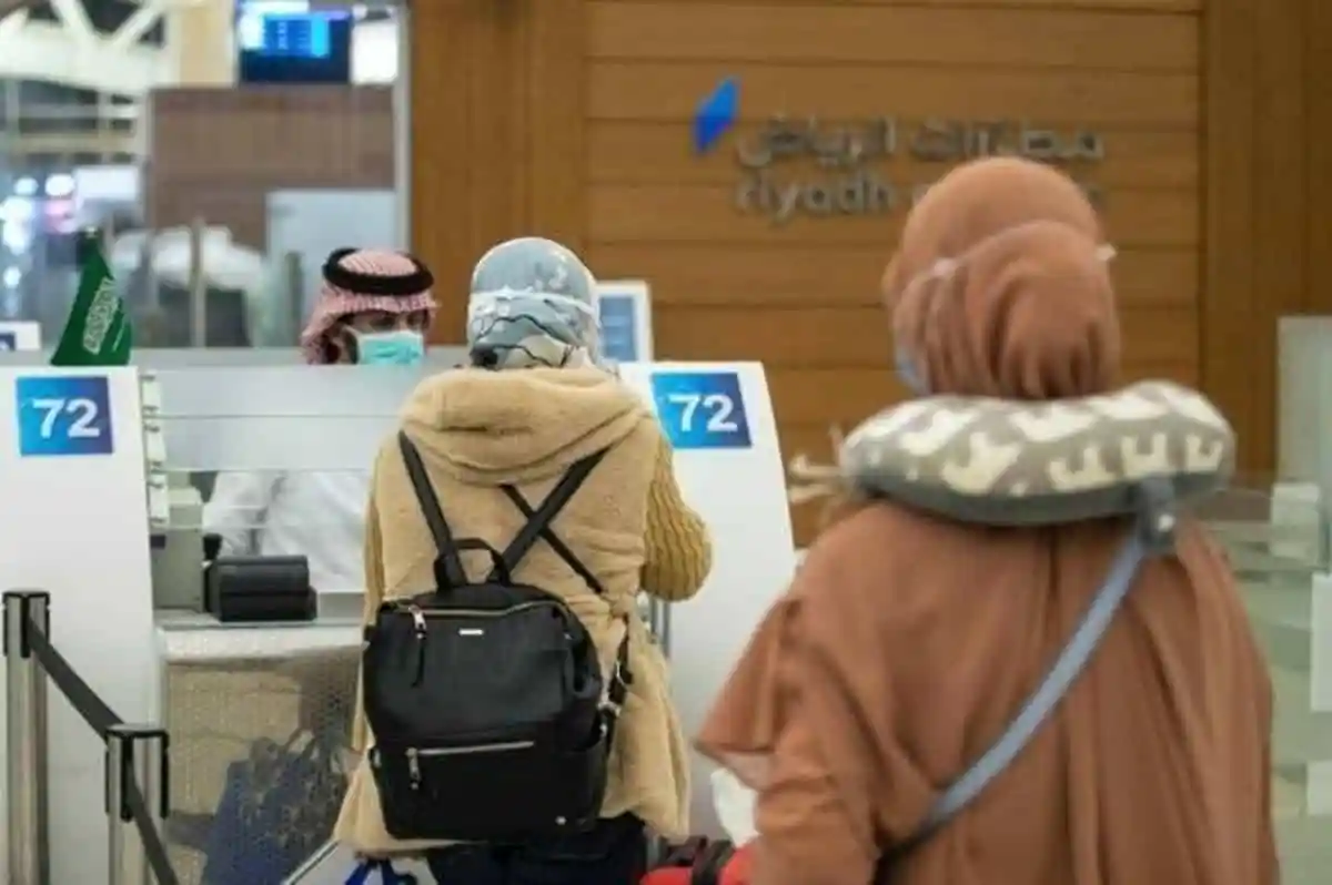 Bangladeshi travelers at Riyadh airport check-in counters. Channel i News - চ্যানেল আই নিউজ
