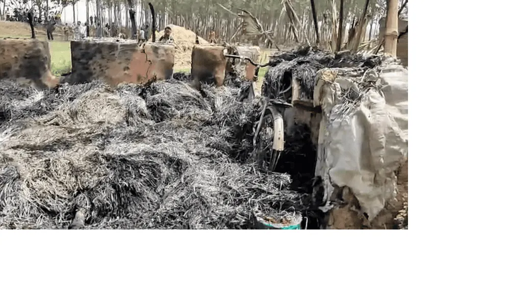 Burned vehicle and debris after fire incident in West Bengal. Channel i News - চ্যানেল আই নিউজ