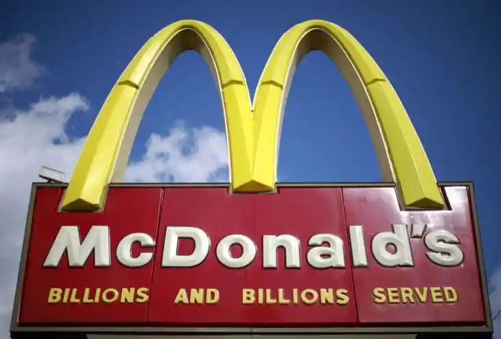 McDonald's logo with golden arches and red background in Bangladesh. Channel i News - চ্যানেল আই নিউজ