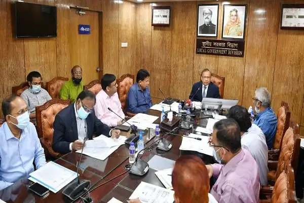 স্থানীয় সরকার মন্ত্রীর সভাপতিত্বে সভা, সবাই মাস্ক পরা. Channel i News - চ্যানেল আই নিউজ
