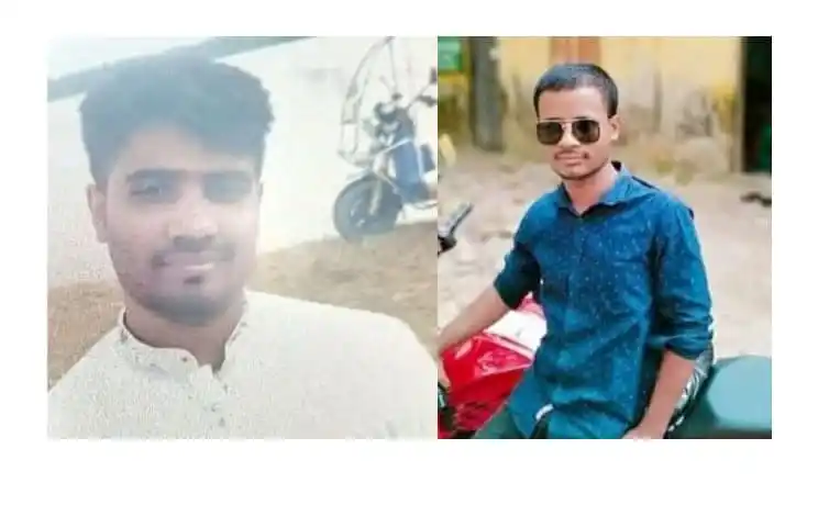 দুটি যুবক, একজন সাদা পোশাক পরা, অন্যজন ব্লু শার্টে সাইকেলসহ. Channel i News - চ্যানেল আই নিউজ