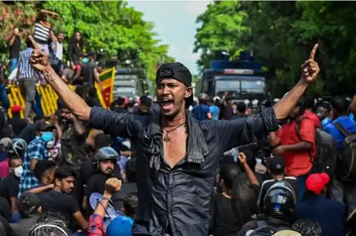 Protester shouting and raising hands during demonstration in Bangladesh. Channel i News - চ্যানেল আই নিউজ