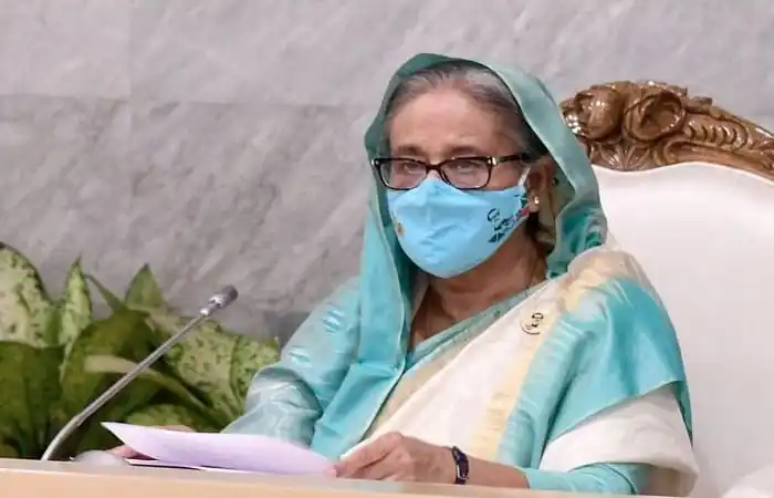 প্রধানমন্ত্রী শেখ হাসিনা মুখে মাস্ক পরে সভায় অংশগ্রহণ করছেন. Channel i News - চ্যানেল আই নিউজ