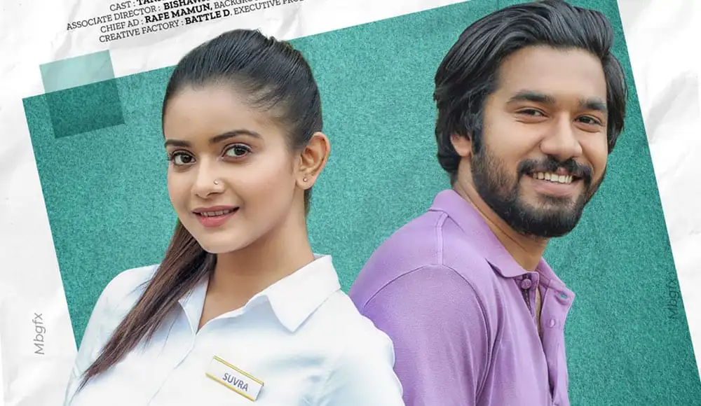 চ্যানেল আই অনলাইন এর দুই তরুণ কর্মী হাসিমুখে ছবি. Channel i News - চ্যানেল আই নিউজ