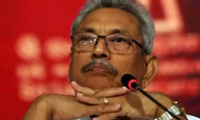 শ্রীলঙ্কার প্রেসিডেন্টের ছবি, তিনি গম্ভীর মুখে বসে আছেন. Channel i News - চ্যানেল আই নিউজ
