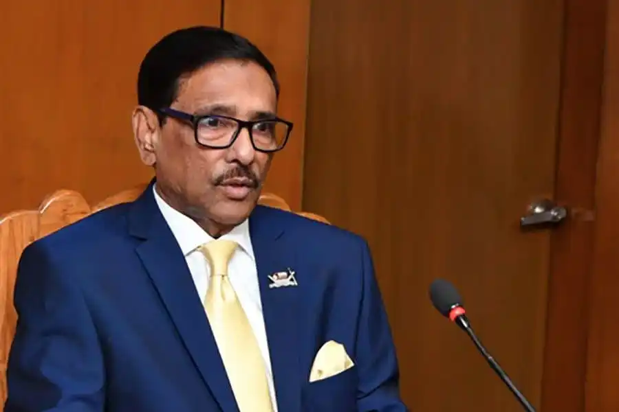 বাংলাদেশের একজন রাজনীতিবিদ, স্যুট ও টাই পরিহিত, বক্তৃতা দিচ্ছেন।. Channel i News - চ্যানেল আই নিউজ