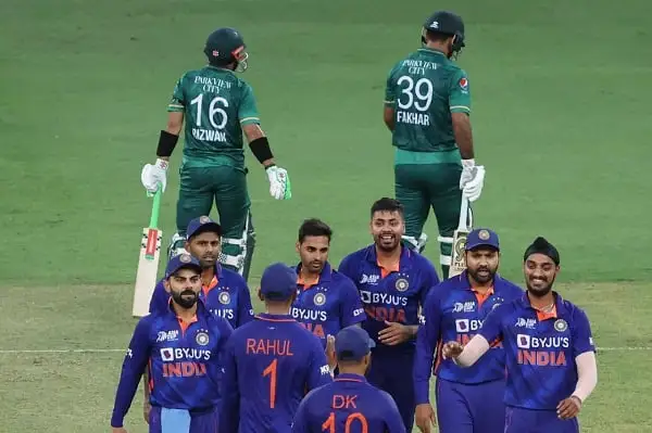 Indian cricket team celebrating after a wicket in a match against Bangladesh. Channel i News - চ্যানেল আই নিউজ