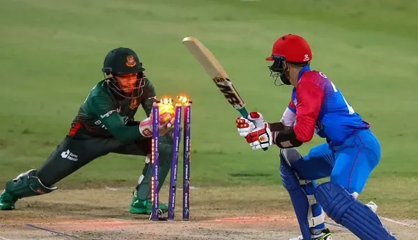 Batsman and wicketkeeper in action during game. Channel i News - চ্যানেল আই নিউজ