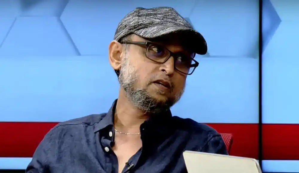 বাংলাদেশের একজন সাংবাদিক বা বিশ্লেষক আলোচনায় অংশগ্রহণ করছেন. Channel i News - চ্যানেল আই নিউজ