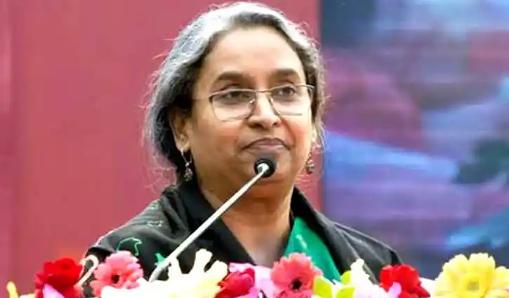 দীপু মনি বক্তৃতা দিচ্ছেন, পেছনে ফুলের সাজানো প্যান্ডেল. Channel i News - চ্যানেল আই নিউজ